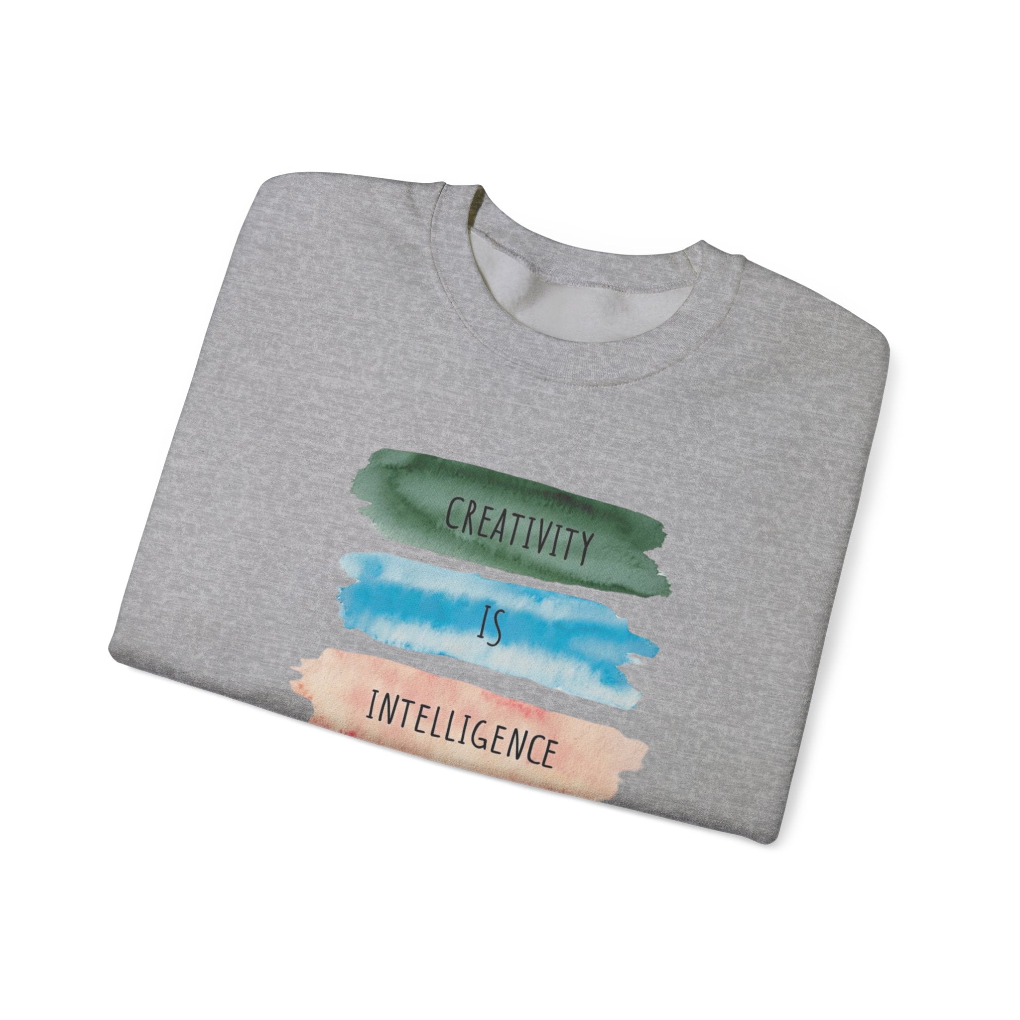 Crewneck Sweatshirt — "Creativity is Intelligence Having Fun" Watercolor Stripes