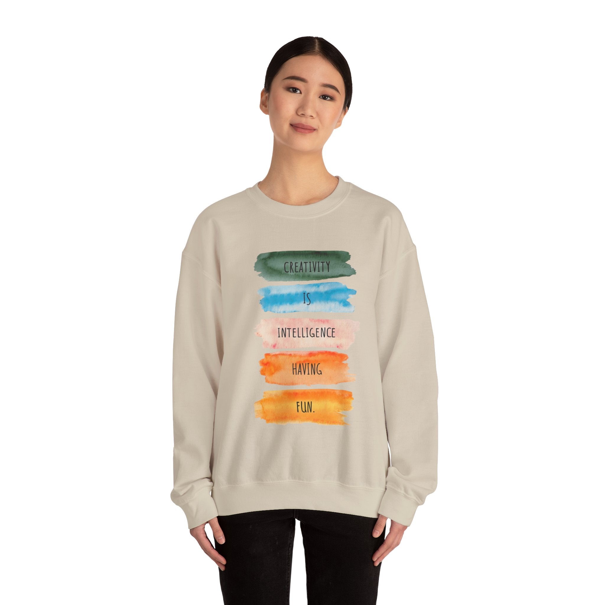 Crewneck Sweatshirt — "Creativity is Intelligence Having Fun" Watercolor Stripes