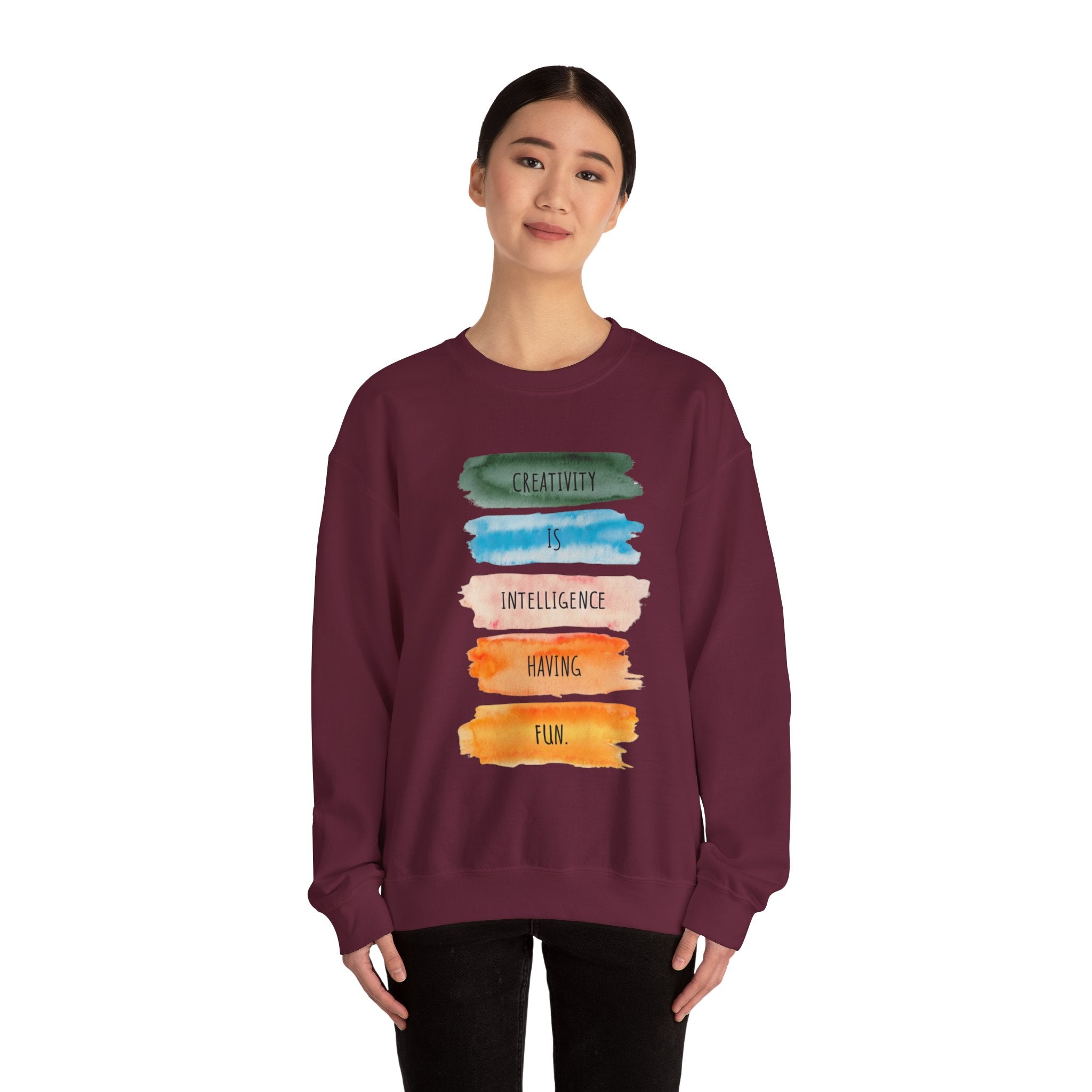 Crewneck Sweatshirt — "Creativity is Intelligence Having Fun" Watercolor Stripes
