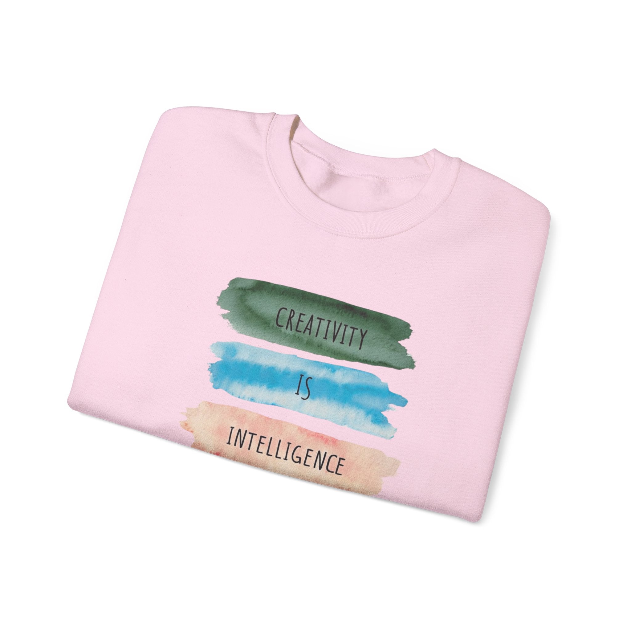 Crewneck Sweatshirt — "Creativity is Intelligence Having Fun" Watercolor Stripes